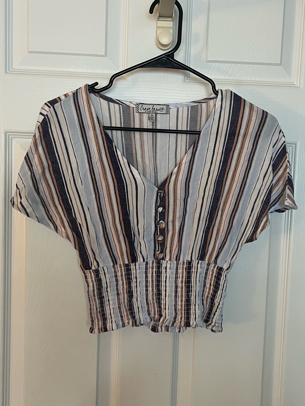 Almost Famous blouse with vertical stripes